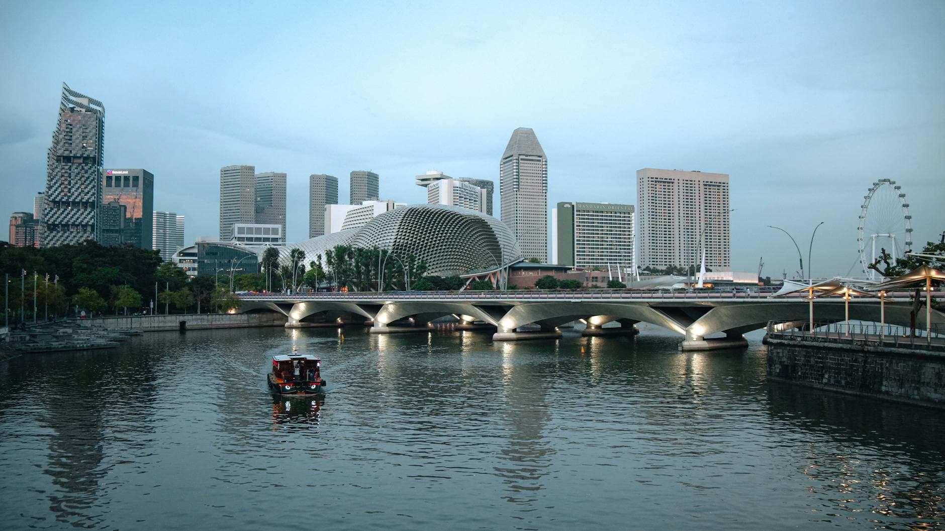 bridge over singapore river with cityscape view
